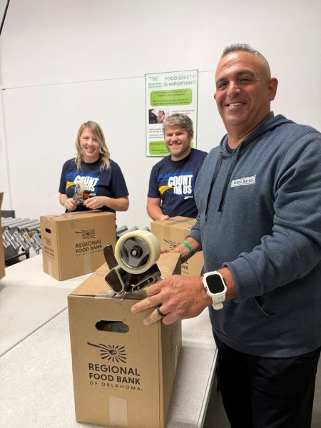 Chuck Rahill and team boxing food